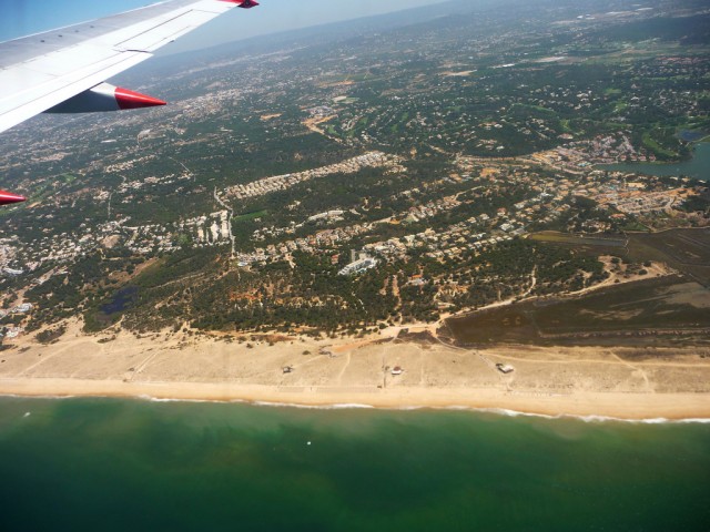 Algarve aerial view over the coast of Faro
