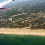 Algarve aerial view over the coast of Faro